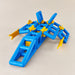 A blue and yellow magnetic building toy structure made of interlocking plastic connectors, photographed on a plain light beige background.
