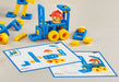 A set of blue and yellow modular building blocks with a small minifigure, arranged on a light beige surface alongside two printed instruction sheets. The instruction sheets show step-by-step assembly diagrams with the same colorful pieces and a minifigure wearing a red hard hat.